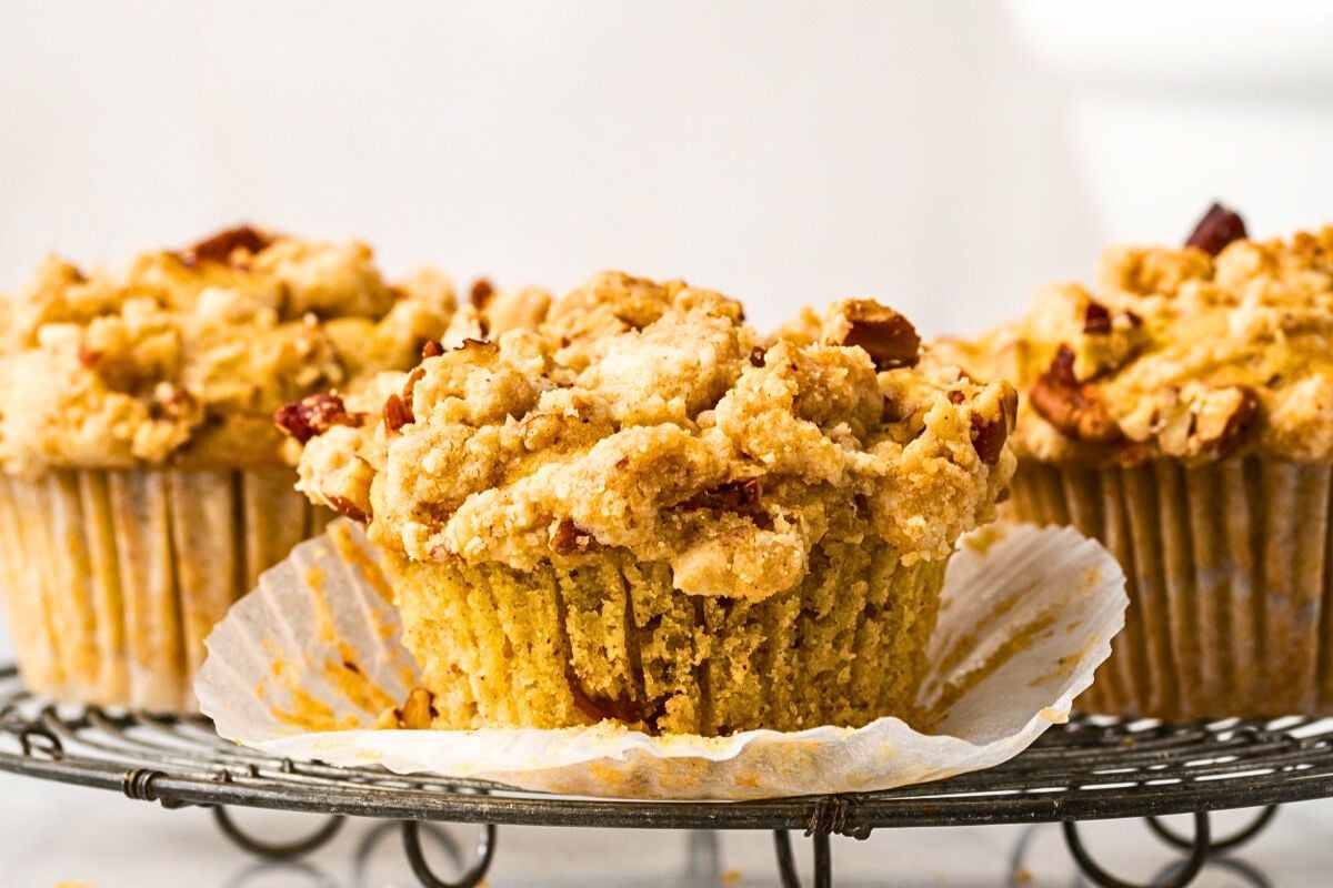  Peach Muffins on a cooling rack. 