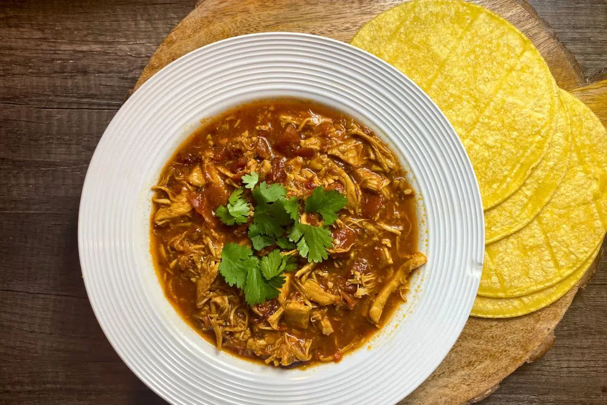 Spicy Chipotle Crockpot Chicken garnished with parsley.