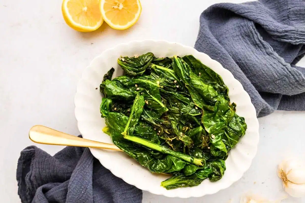 Turnip Greens in a bowl place at the table.