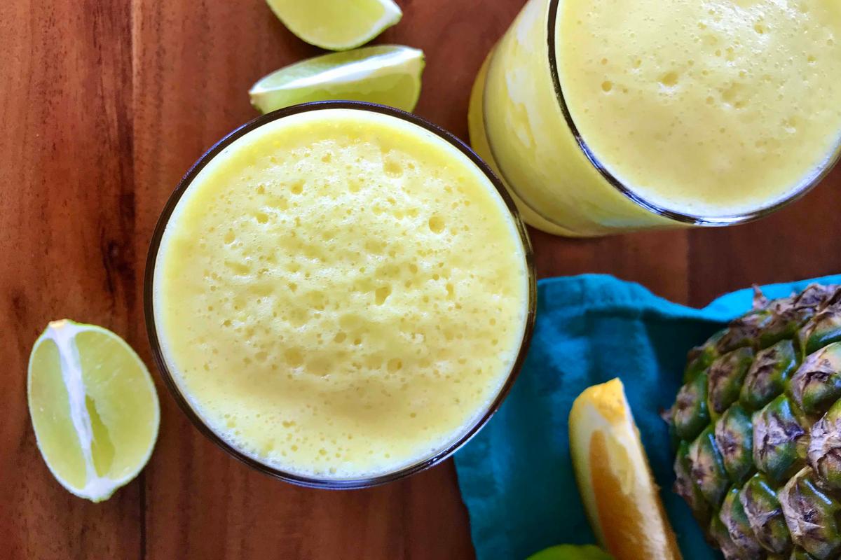 A glass of Frozen Pineapple Virgin Margarita.