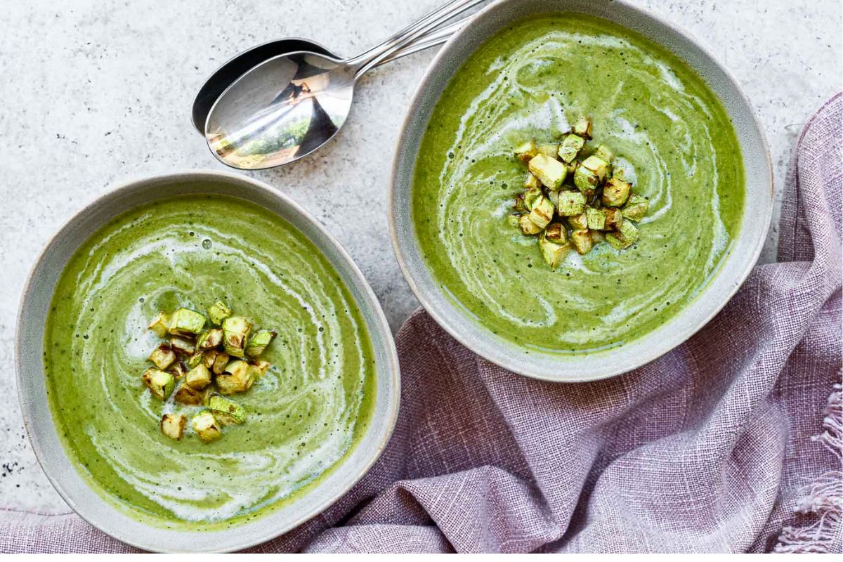 Zucchini, Pea and Basil Soup overhead shot image. 