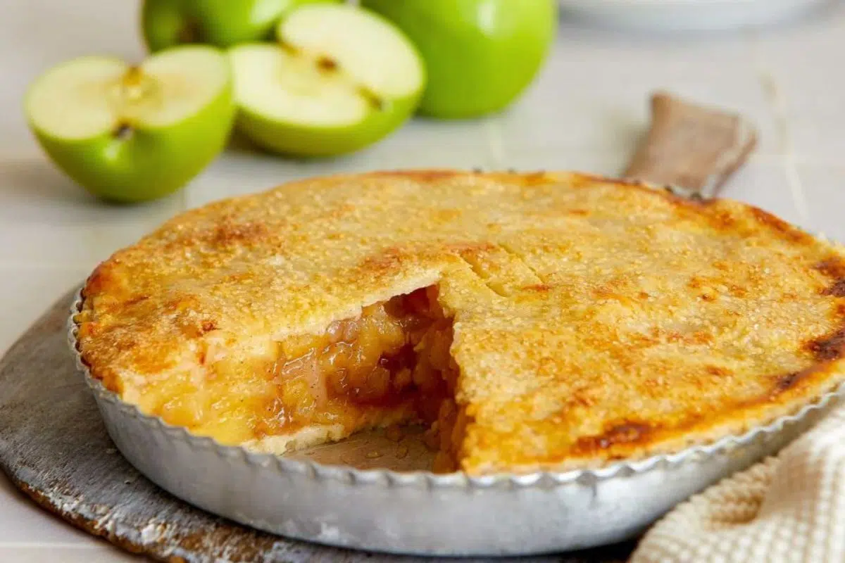 Apple Cider Pie served in a pan.