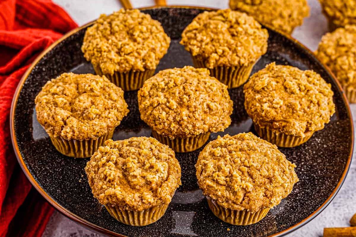 Apple Muffins With Streusel Topping served on a plate.