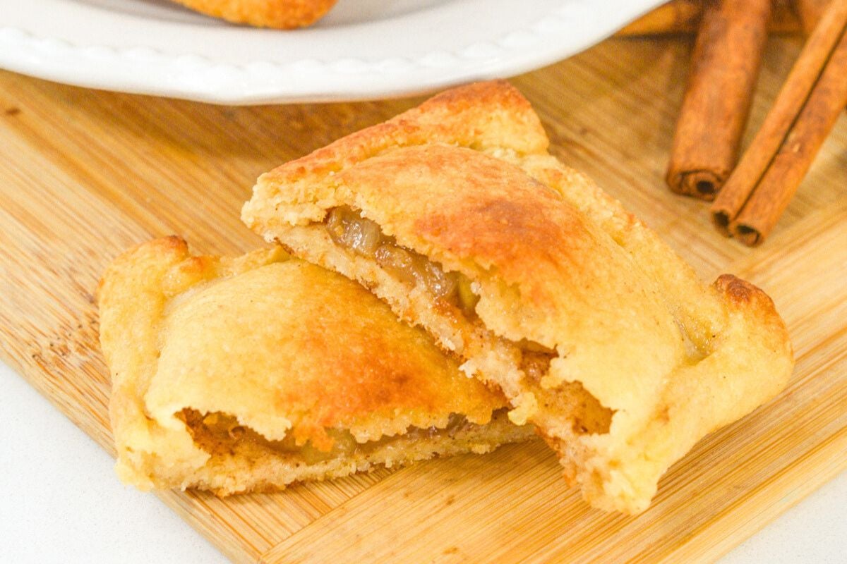 Apple Turnovers on a wooden board.