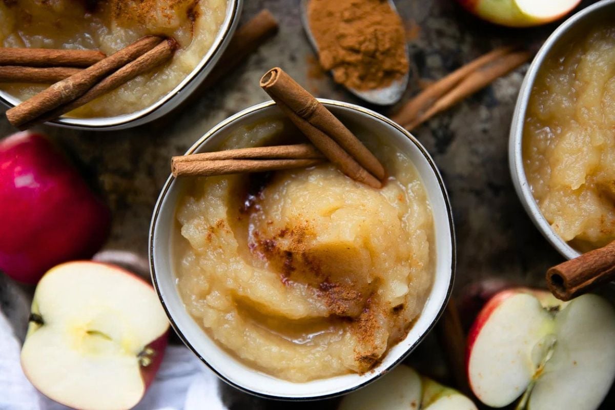 Applesauce with cinnamon sticks.