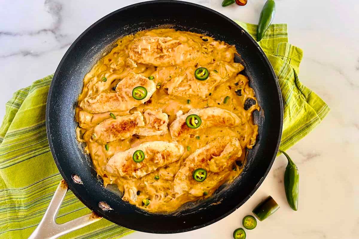 Cheesy Jalapeño Chicken in a skillet.