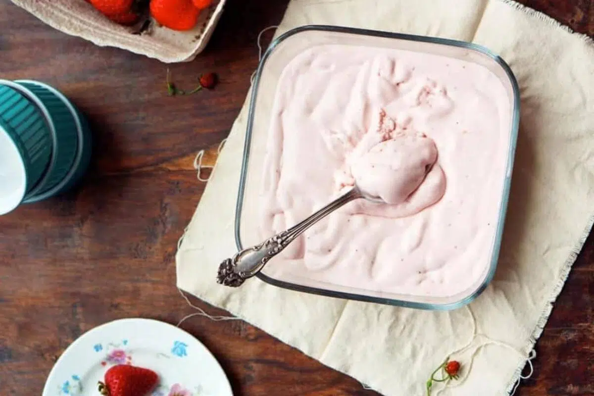 A dish of strawberry ice cream.