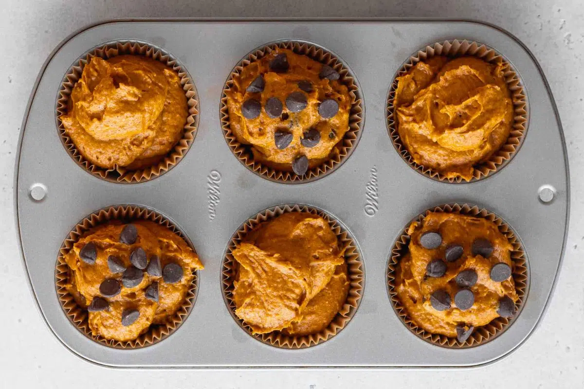 Pumpkin Muffins in a baking tin.