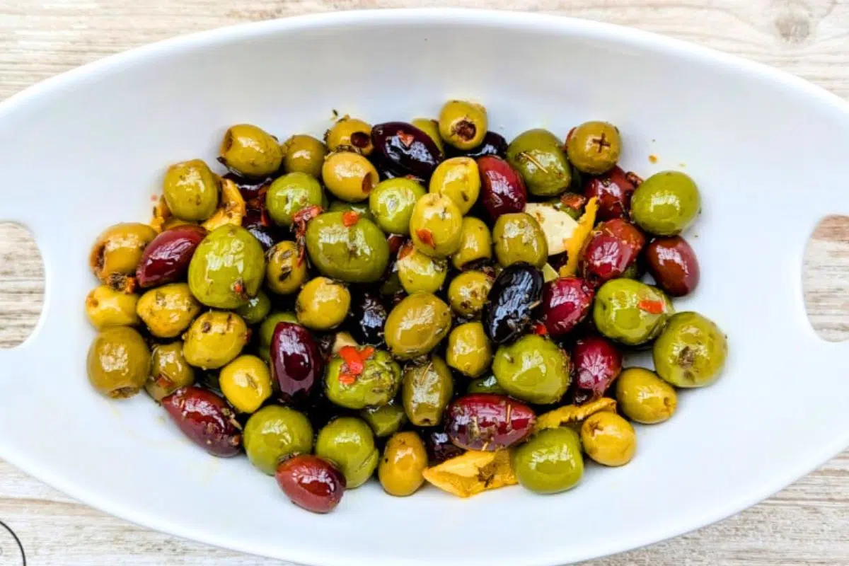 Slow Cooker Marinated Olives served in a bowl.