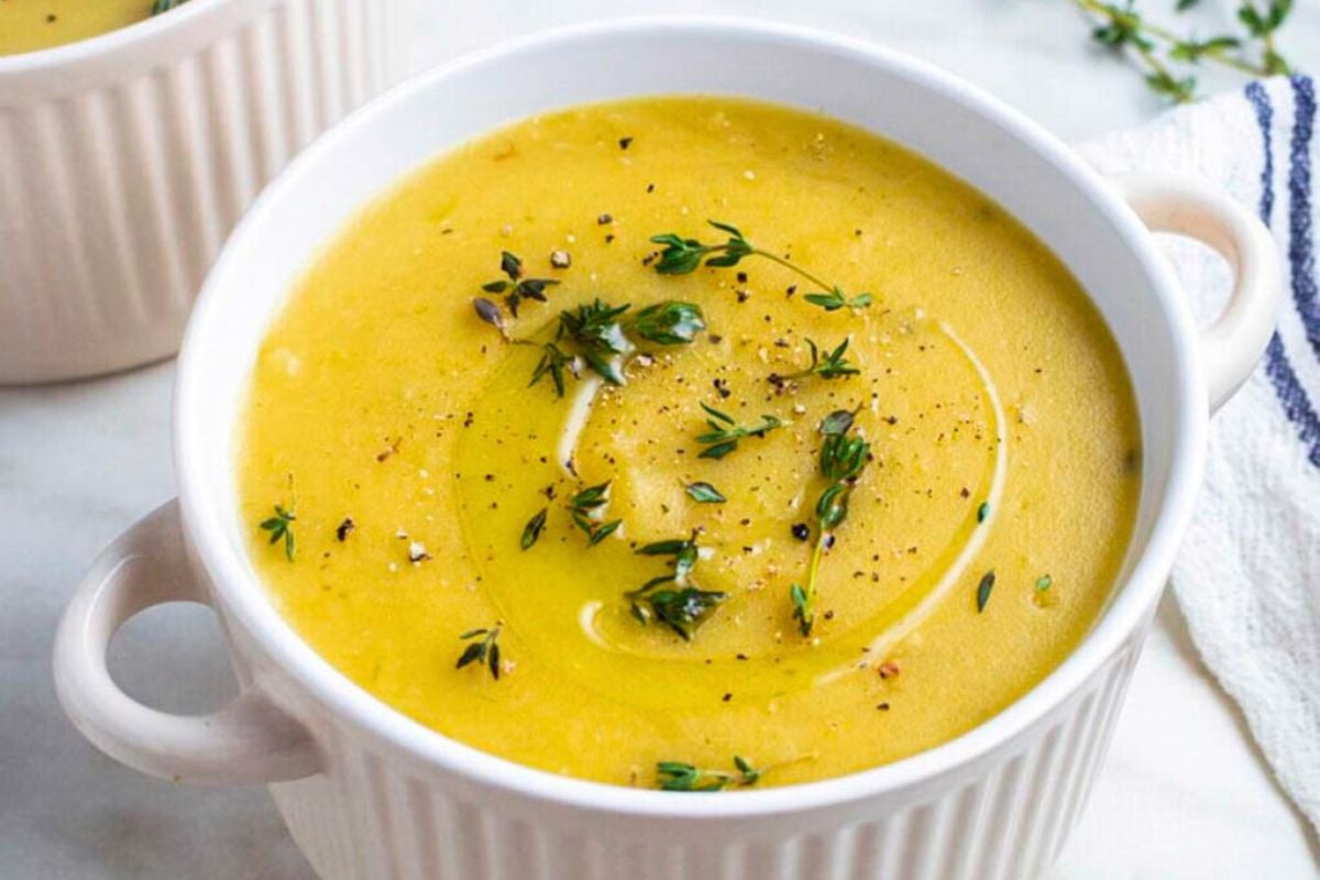 Potato Leek Soup served in a bowl.