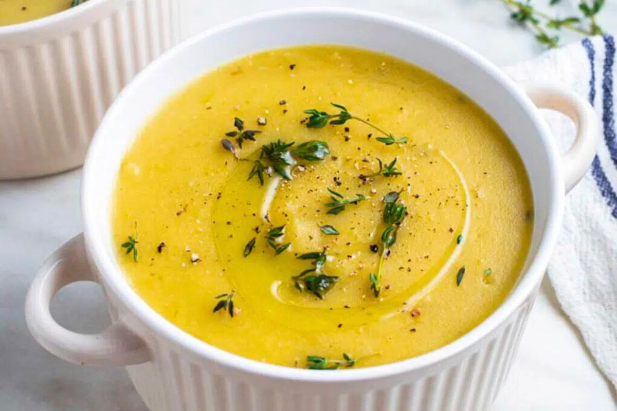 Potato Leek Soup served in a bowl.