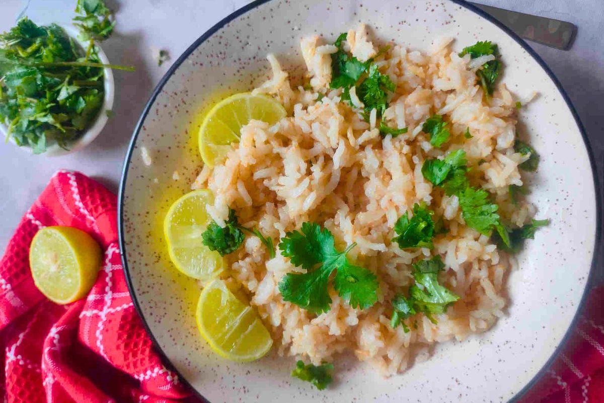 Chipotle's Cilantro Lime Brown Rice garnished with cilantro.