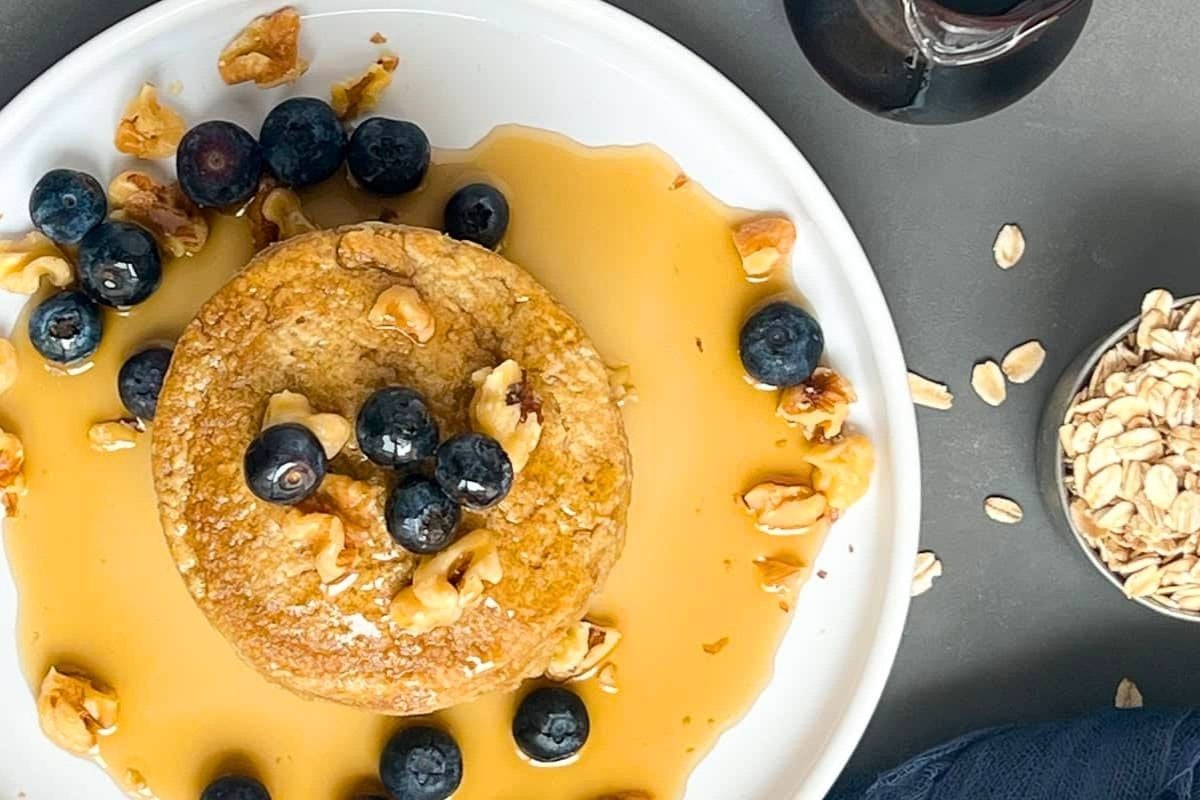 Oat Flour Pancakes topped with blueberries.