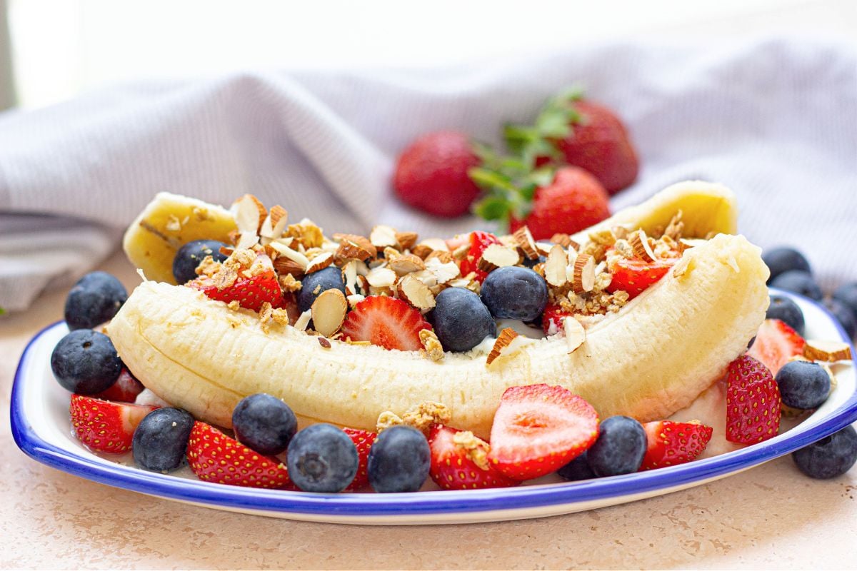 Breakfast Banana Split with nuts and berries.