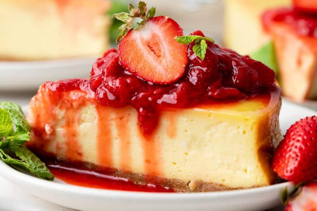 A slice of strawberry cheesecake.