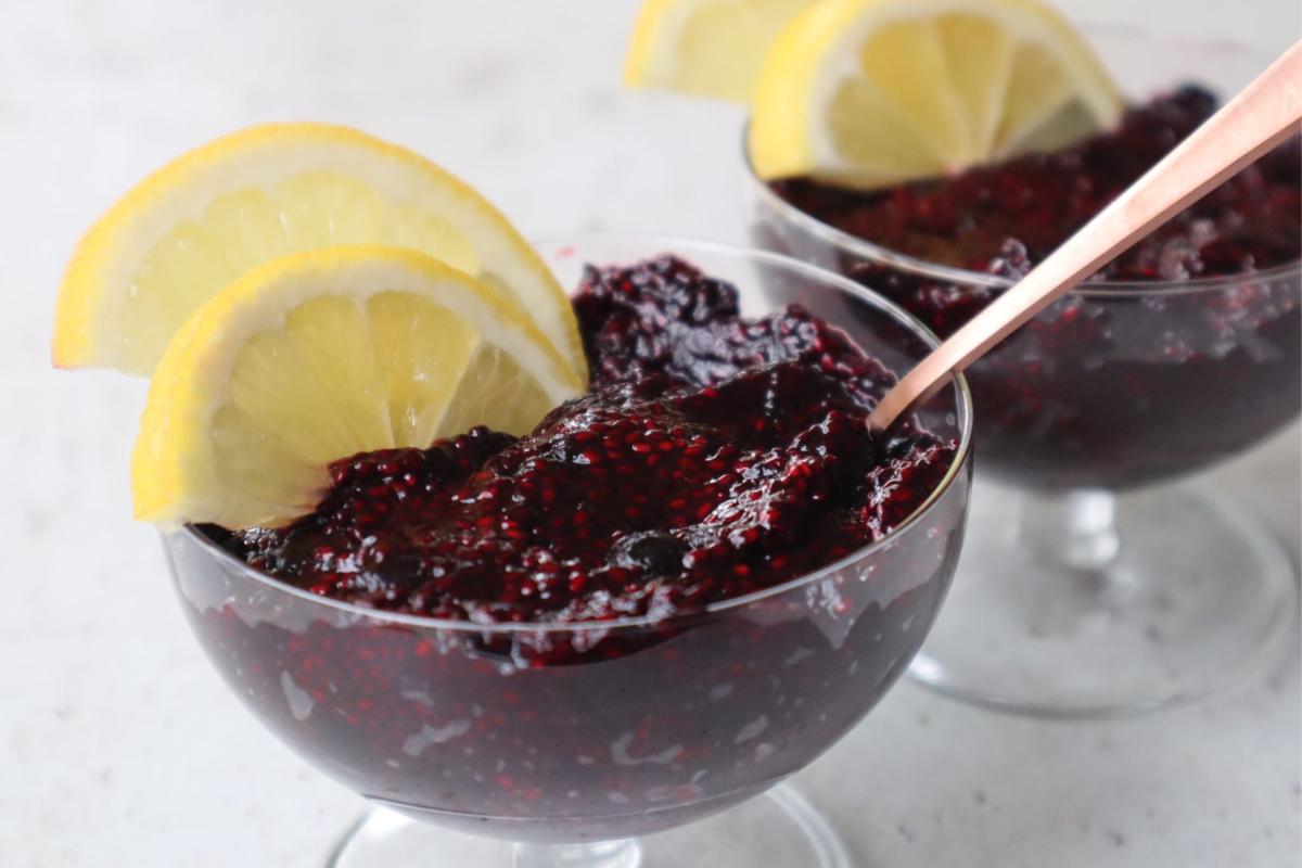 Blueberry chia seed pudding with lemon slices.