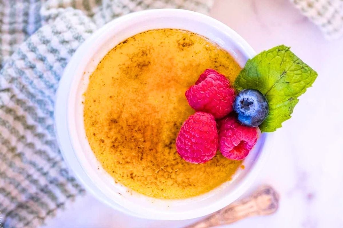 Creme Brulee topped with berries.