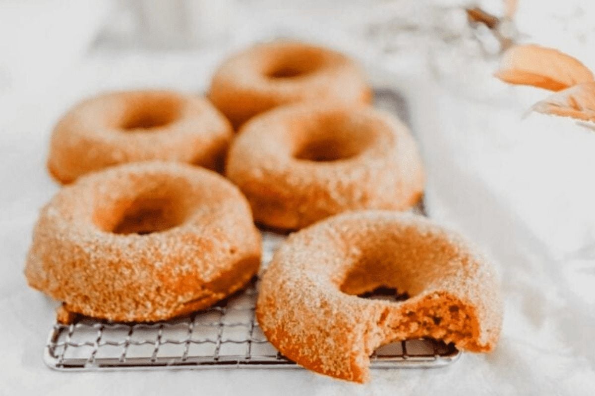 Gingerbread Donuts on a cooling rack.