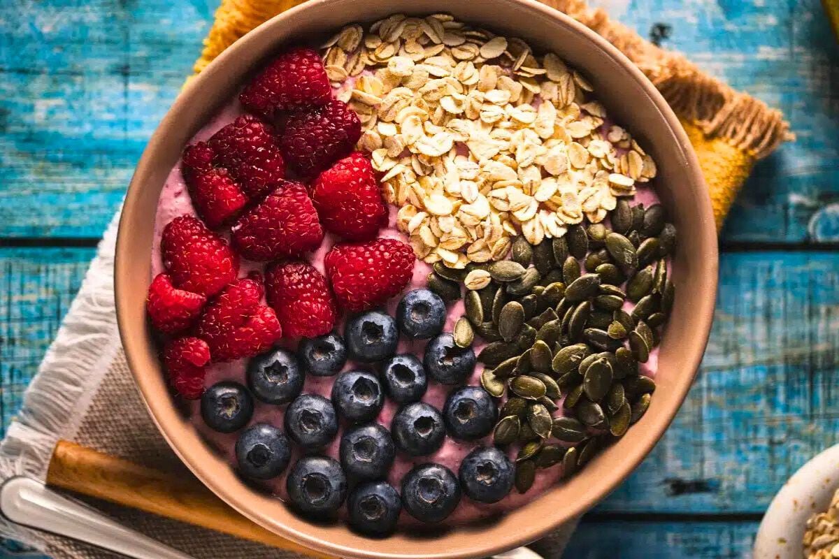 Berry Yogurt Bowl topped with berries.
