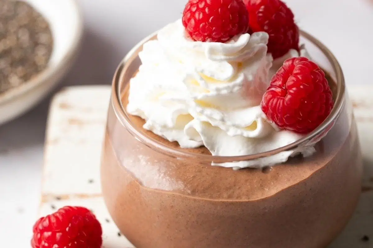 Chocolate chia pudding with whipped topping.
