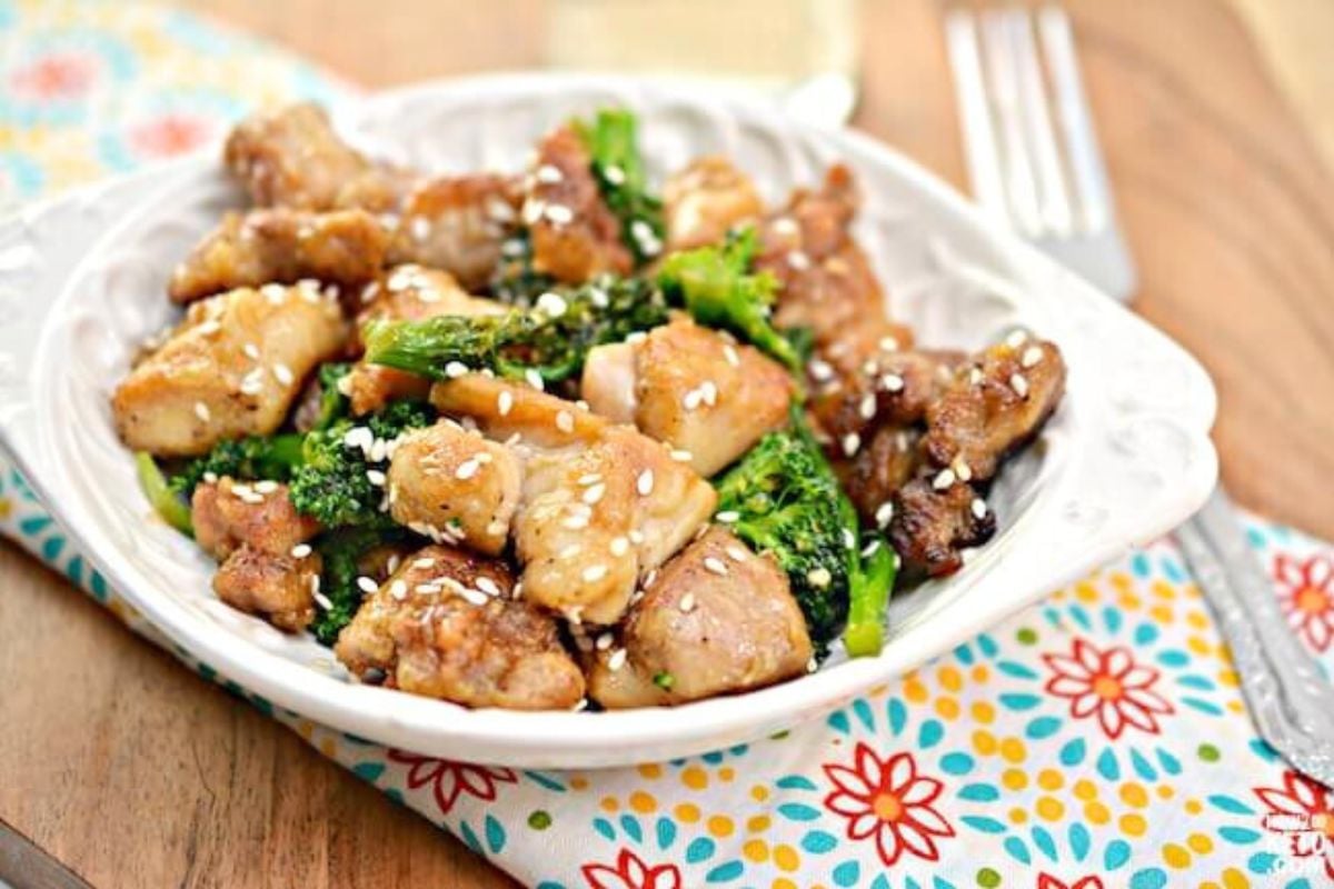 Sesame Chicken with Broccoli served in a bowl.