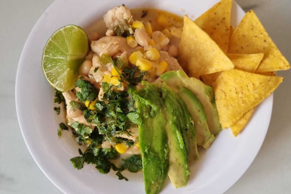 Macro Friendly White Chicken Chili served on a plate.