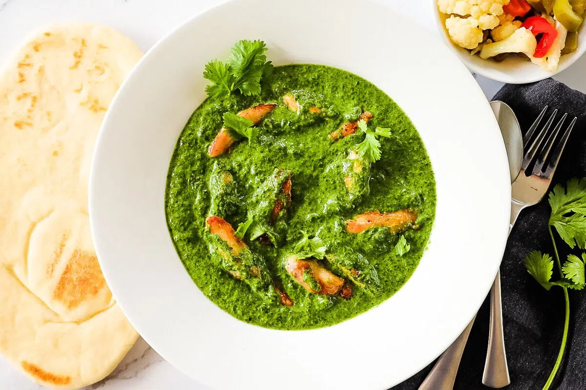 Palak Chicken served in a bowl.