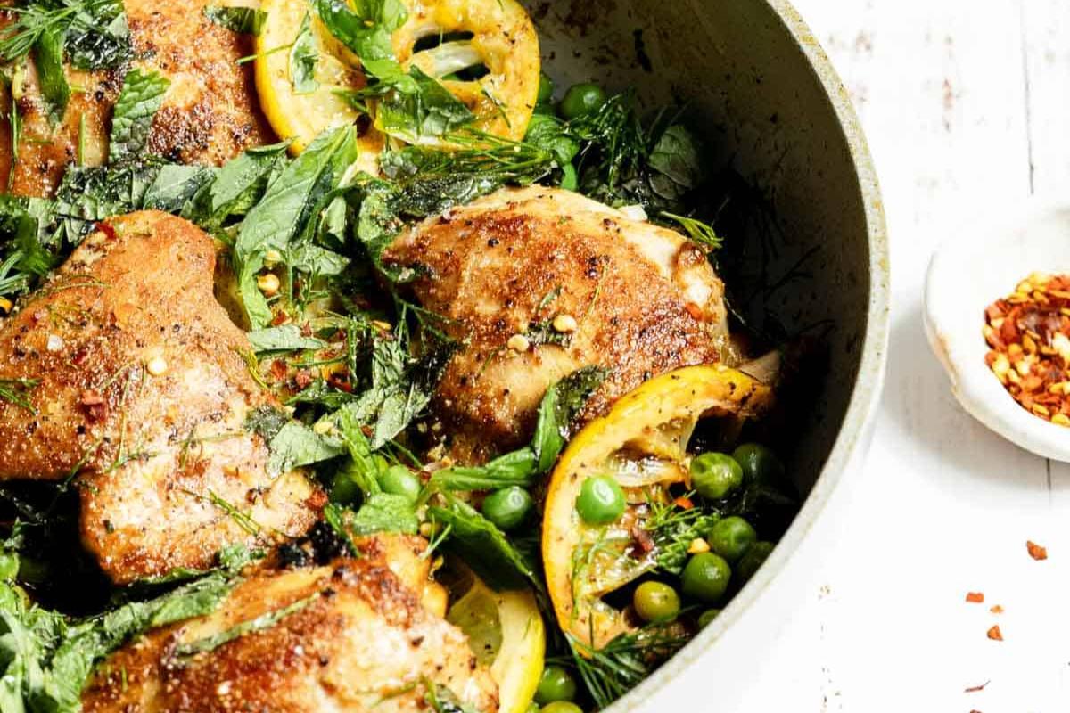 Skillet Chicken and Peas With Fresh Herbs overhead view.