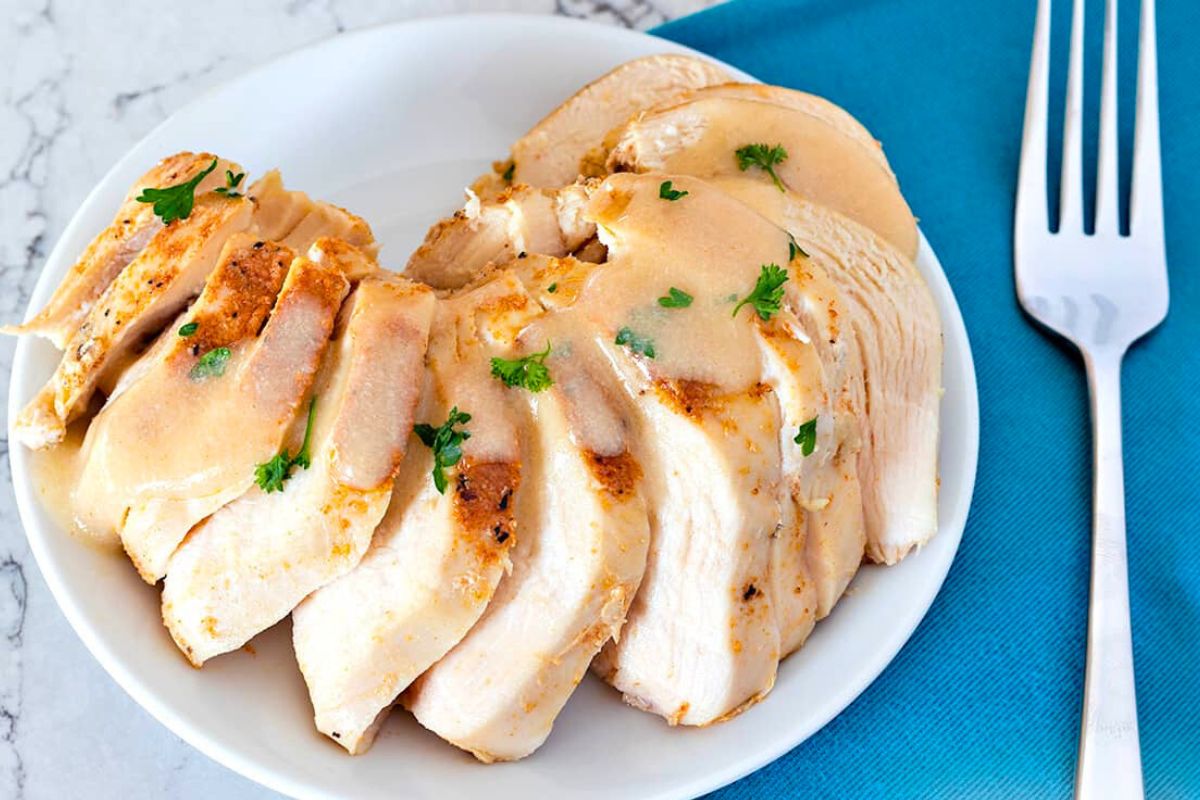 Slow Cooker Chicken Breasts served on a plate.
