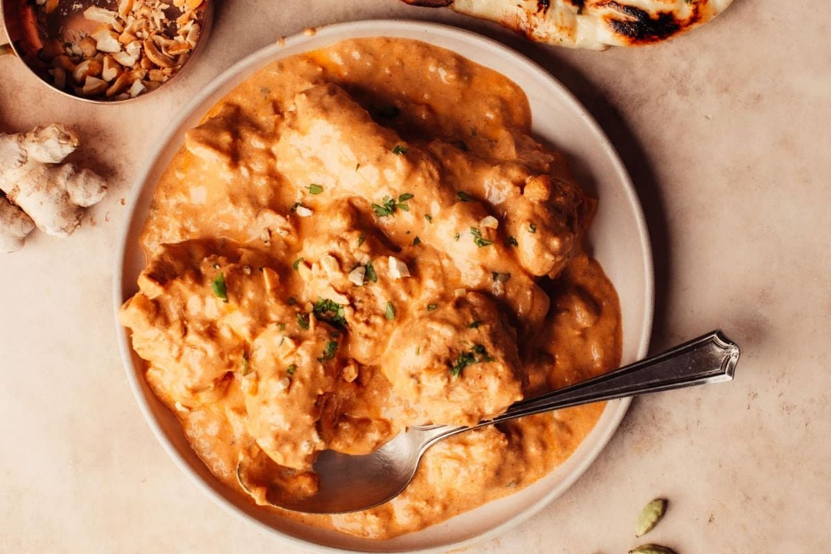 Chicken Korma served on a plate.