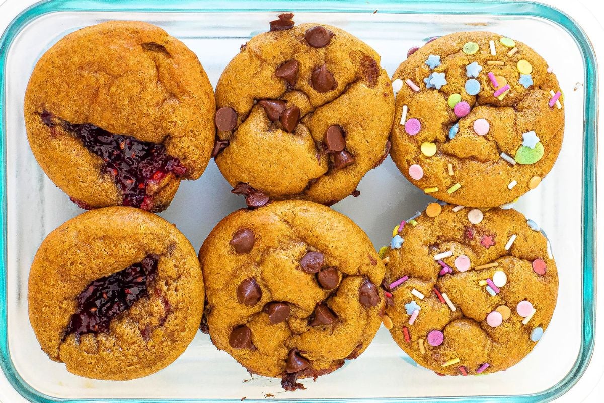 Mini Flourless Peanut Butter Muffins in a glass container.