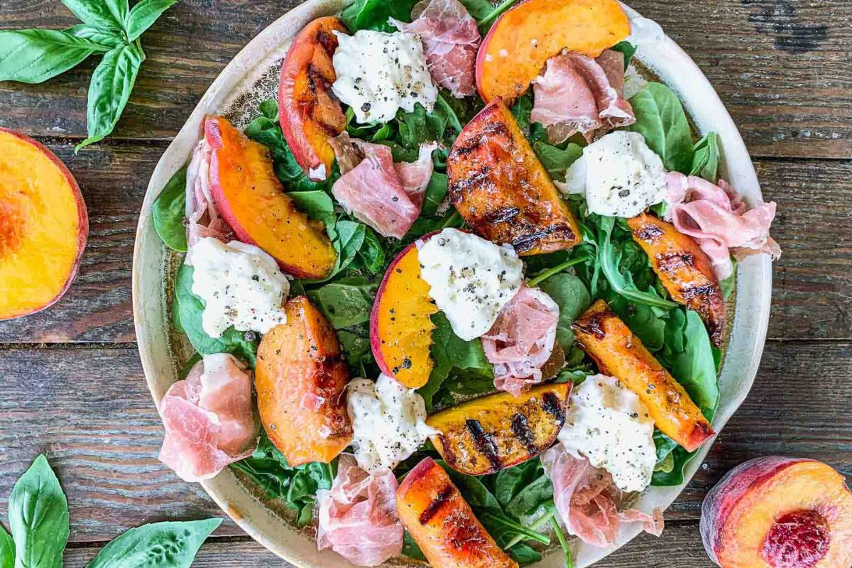 A grilled peach burrata salad.