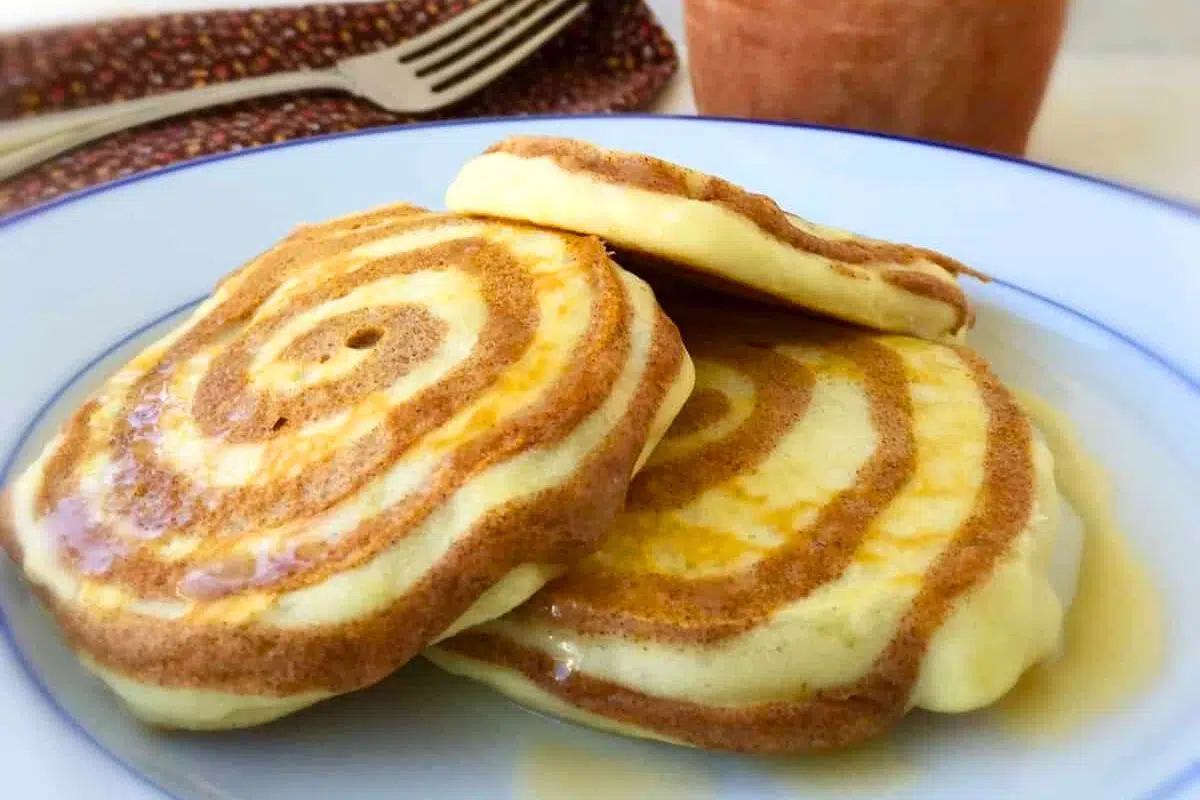 Cinnabon Pancakes served on a plate.
