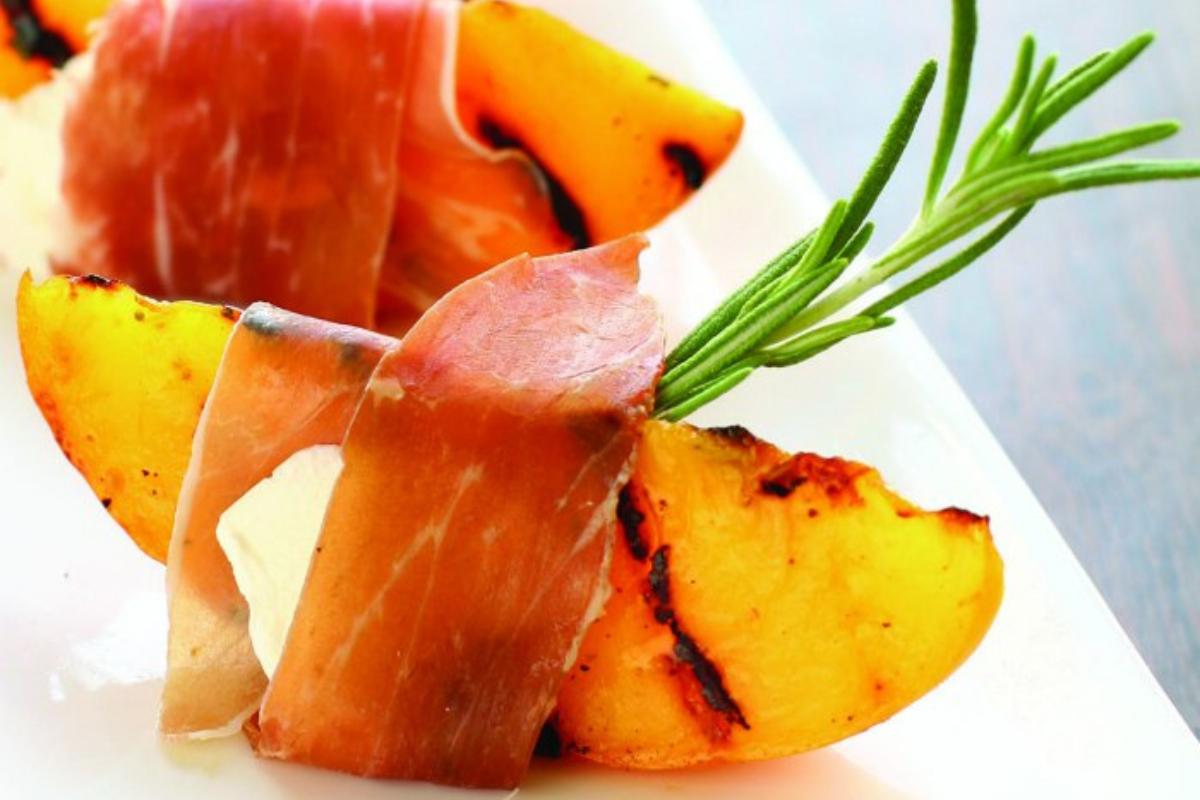 Prosciutto wrapped peaches.