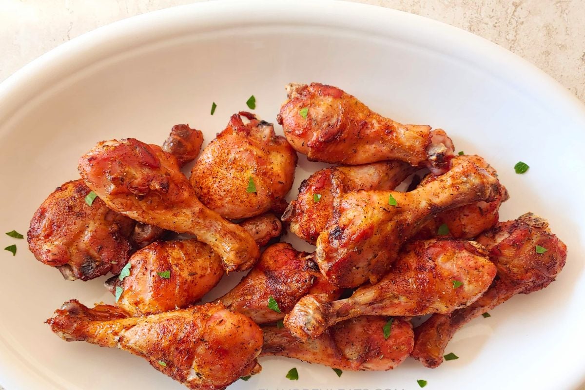 Spicy Baked Chicken Drumsticks served on a plate.