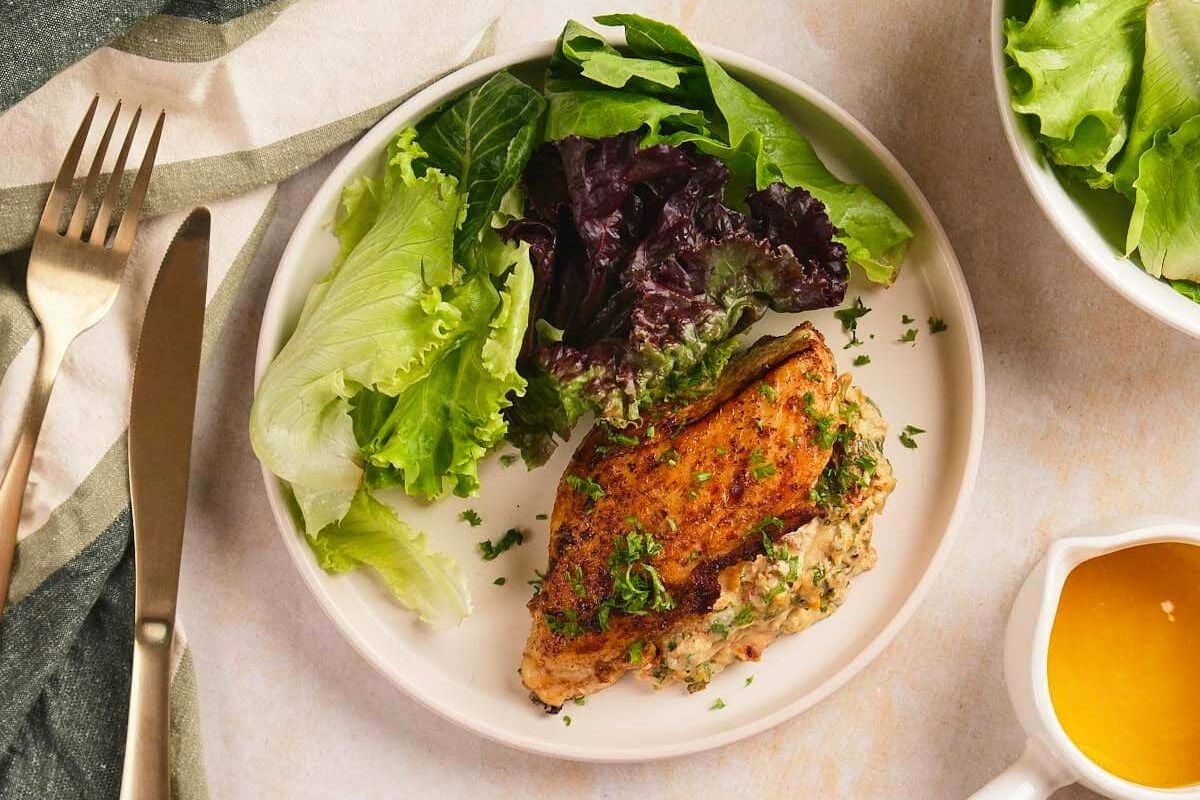 Baked Stuffed Chicken Breast served on a plate.