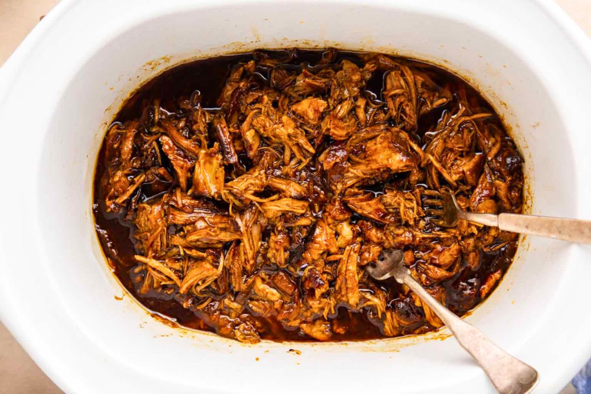 BBQ Pulled Pork in Crock Pot with Root Beer overhead view.