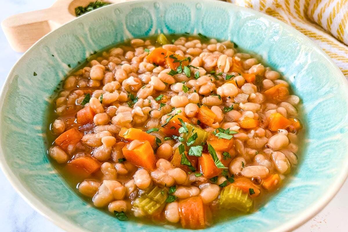Instant Pot Navy Bean Soup served in a bowl.