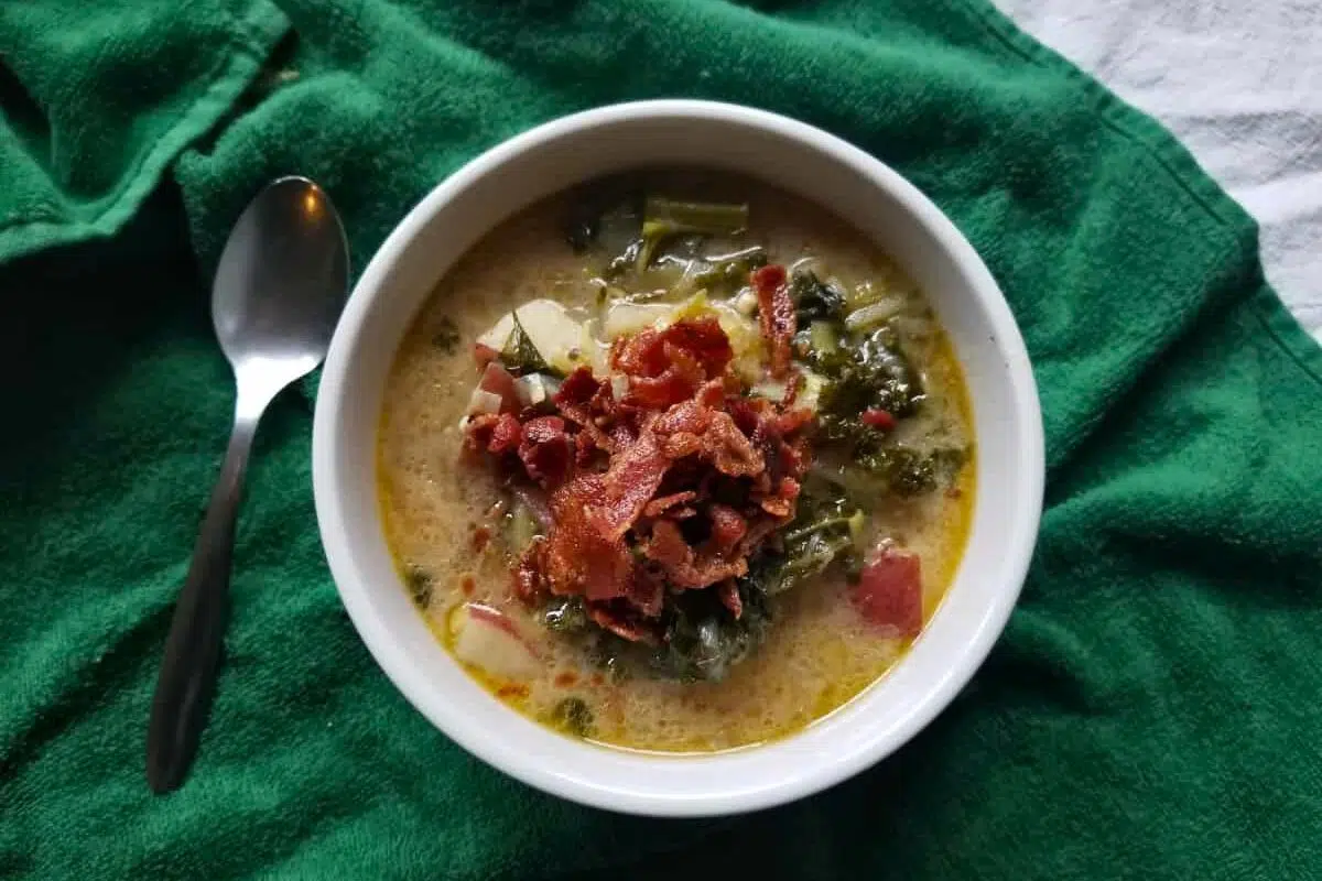 Potato Leek and Bacon Soup served in a bowl.