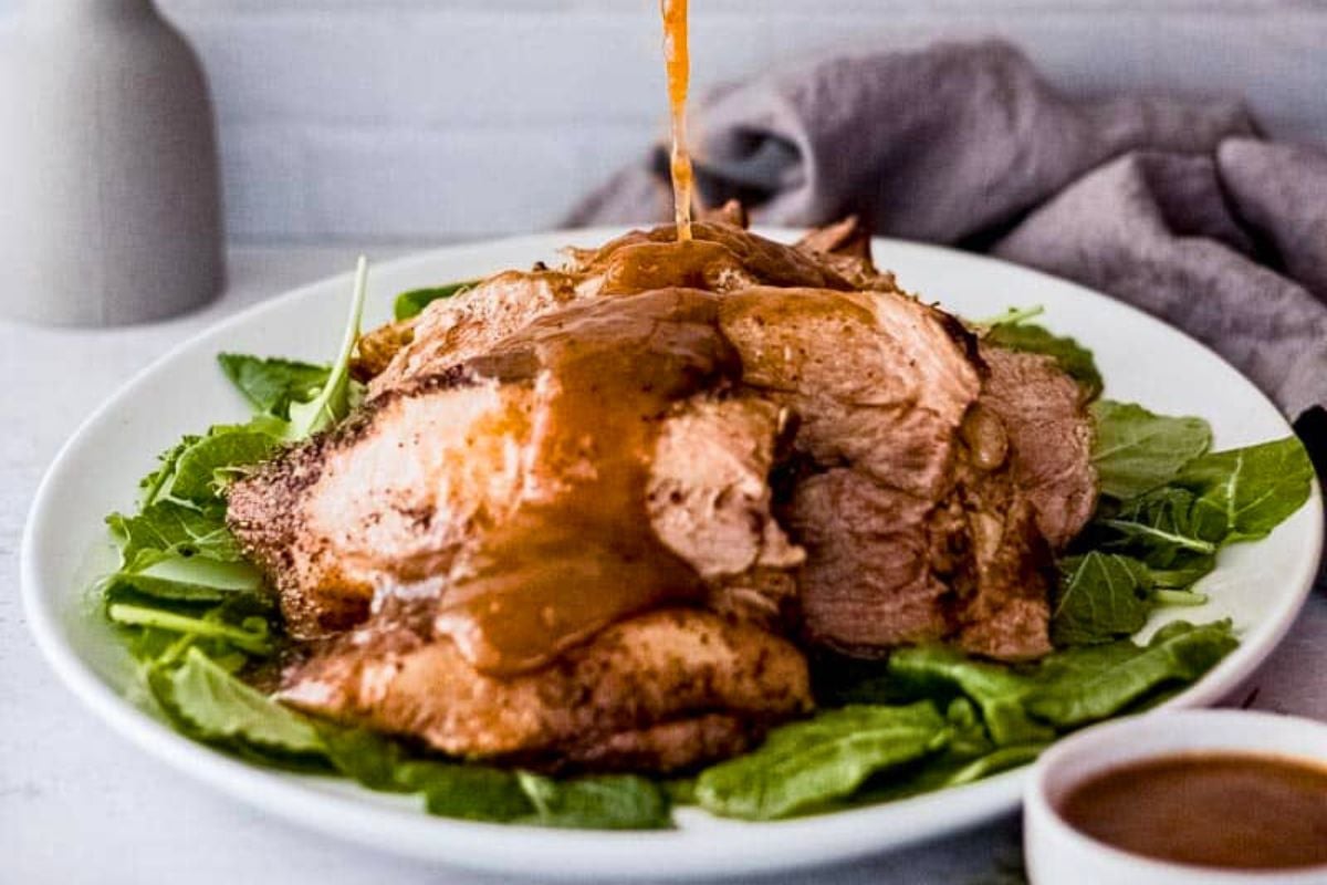 Instant Pot Pork Roast poured with gravy.