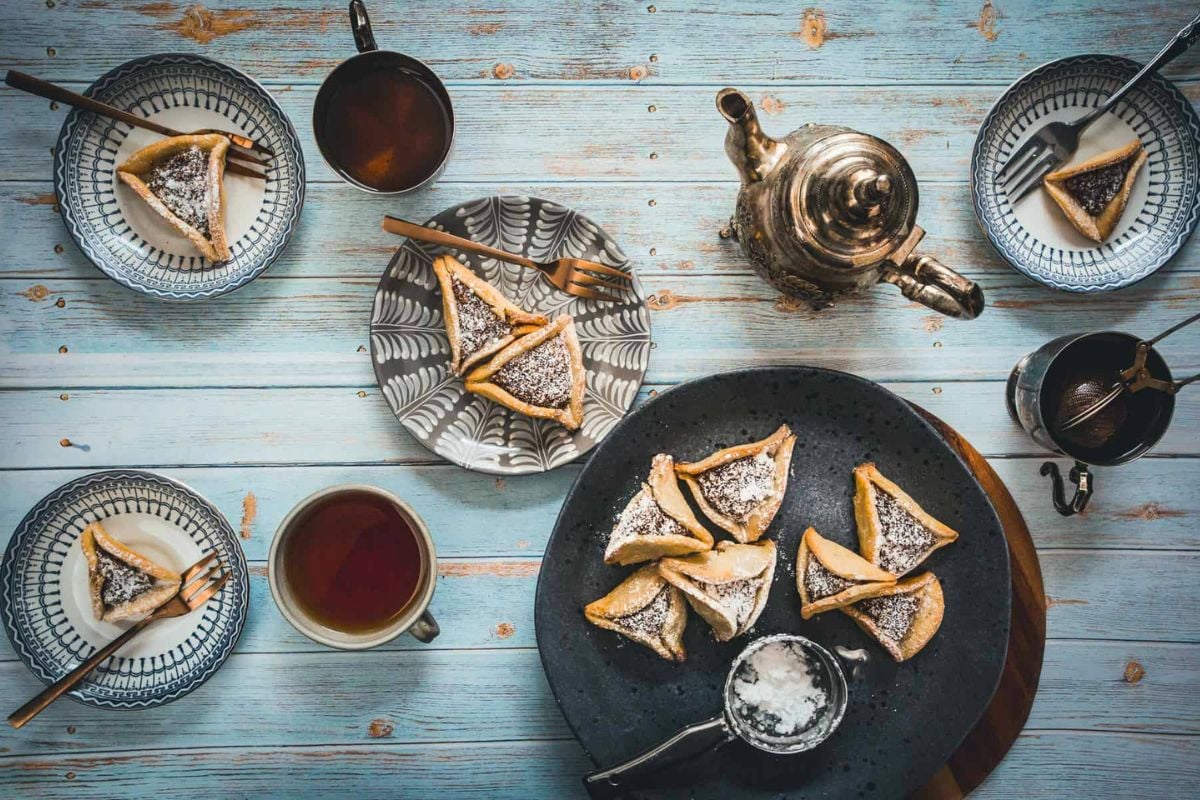 Hamantaschen Cookies with Orange and Date Filling overhead view.