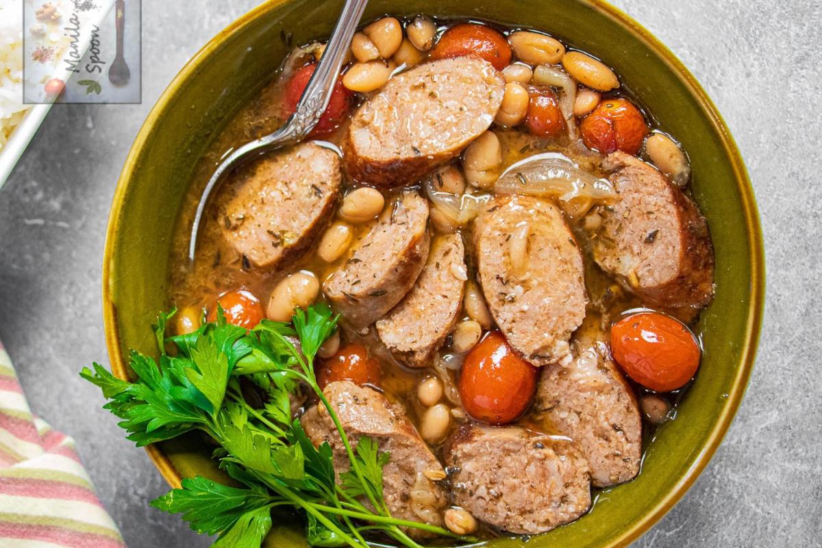 Slow Cooker Sausage and White Bean Cassoulet with cilantro.