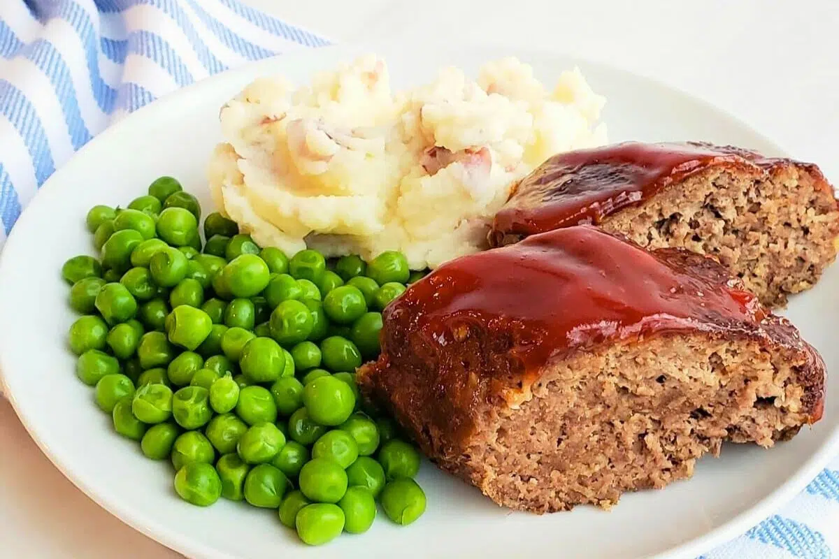 Air Fryer Meatloaf with Tangy Sauce on a plate.