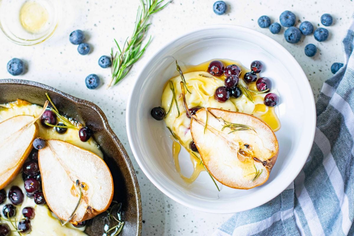Baked Pears and Cheese with Blueberries overhead view.