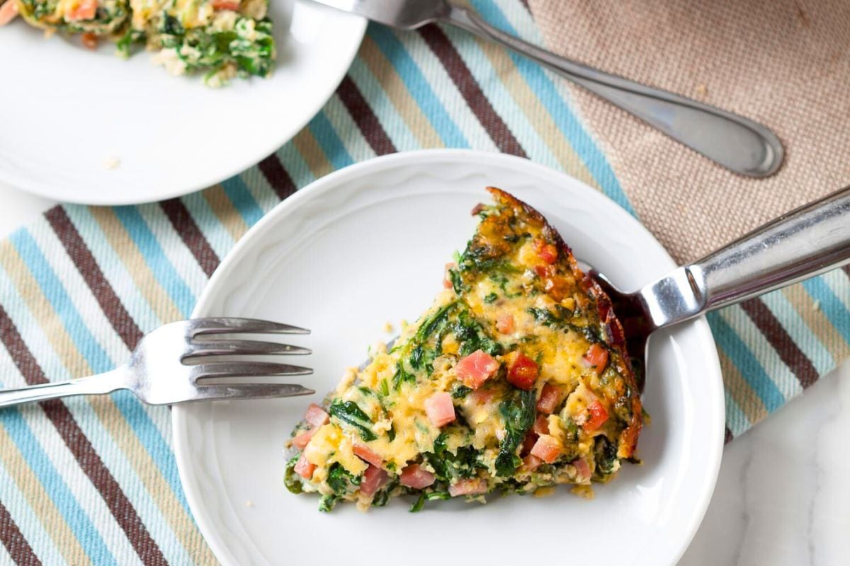 Overhead view of Crustless Quiche served on a plate.
