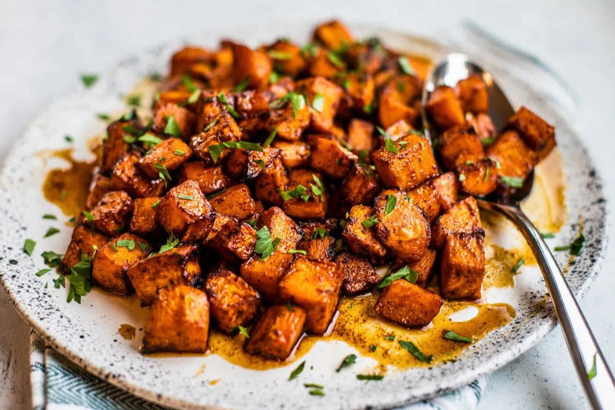 Honey Lime Air Fryer Sweet Potatoes on a plate.
