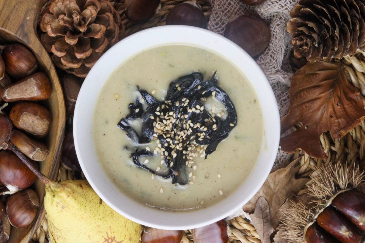 Pear Potato Soup with Black Trumpet Mushrooms in a bowl.