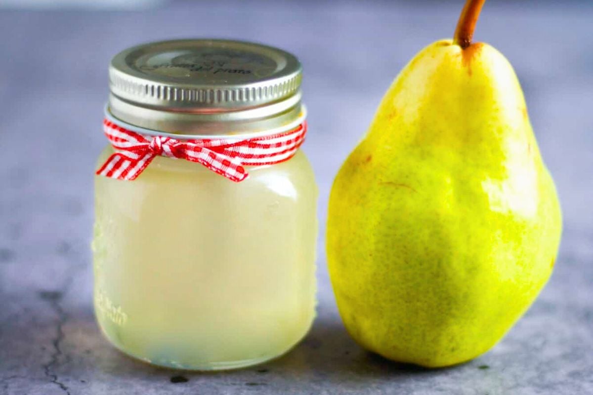 Pear Simple Syrup in a small jar.