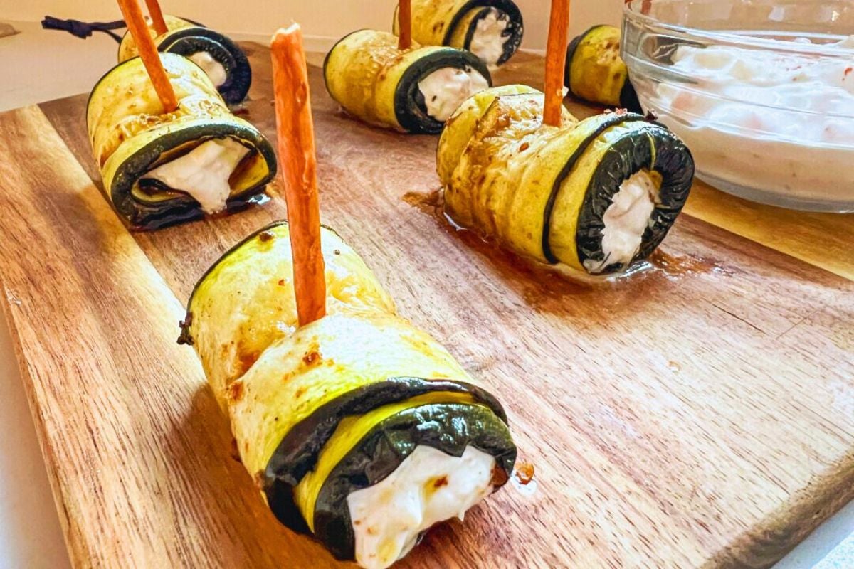 Roasted Zucchini Rolls with Shrimp and Cheese close up look.