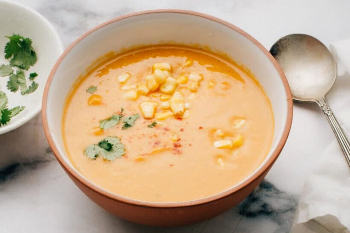 Sweet Potato Soup with Coconut and Corn in a bowl.